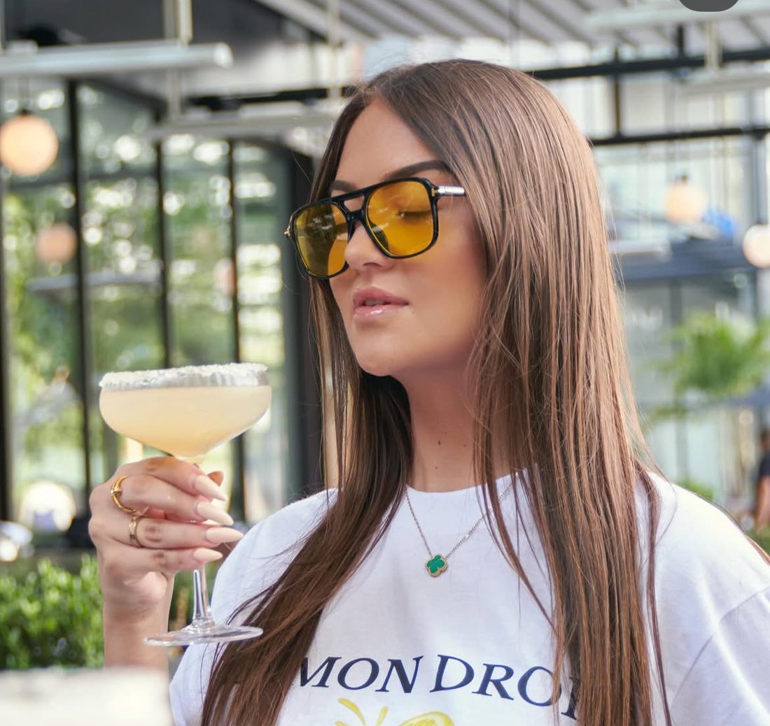 Lemon Drop tee, cocktail in hand